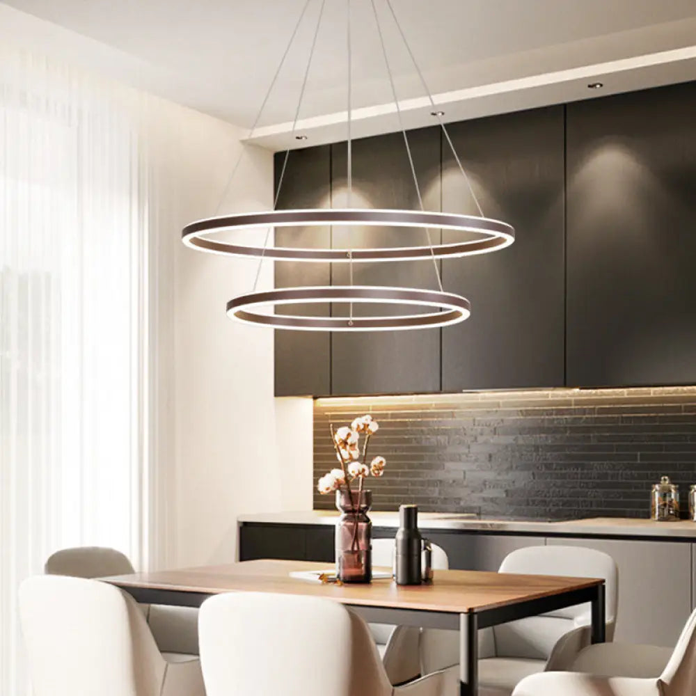 Chandeliers with Candle - Style Bulbs for a Classic AestheticChandeliers with Candle - Style Bulbs for a Classic AestheticBrown 4 Tier Minimalistic Acrylic LED Ring Chandelier for Dining Room