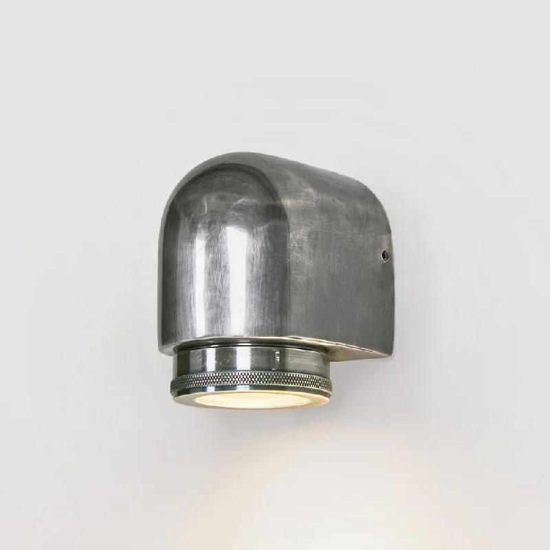 wood wall lamps with natural grain for a warm and organic feelSea Rock Outdoor Wall Light Antique Silver
